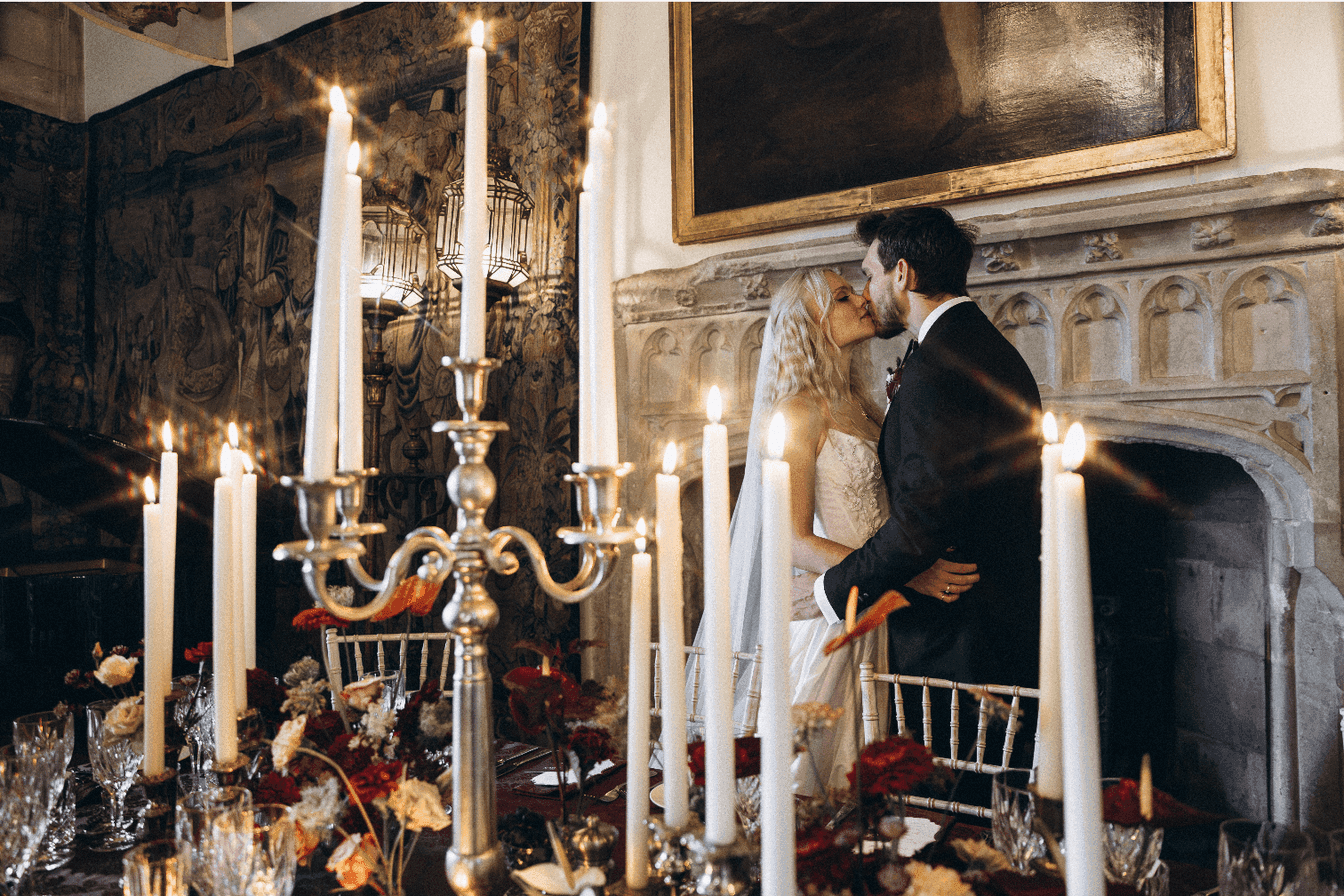Carson and Scott on their wedding day at Berkeley Castle, United Kingdom